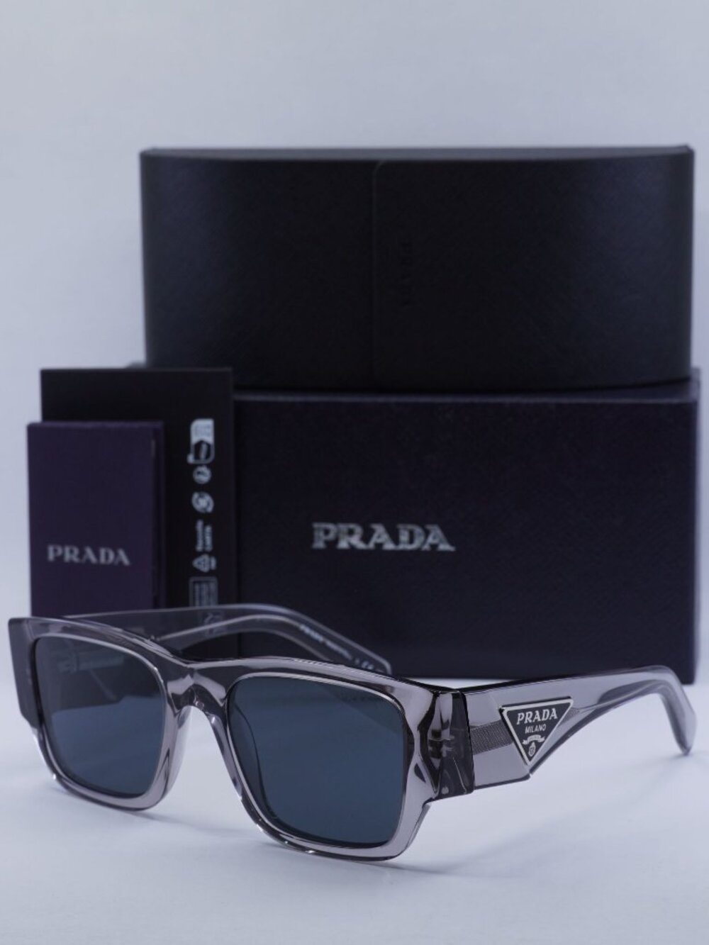Prada PR10ZS 16Z70B Square Sunglasses – Transparent Asphalt\Dark Grey